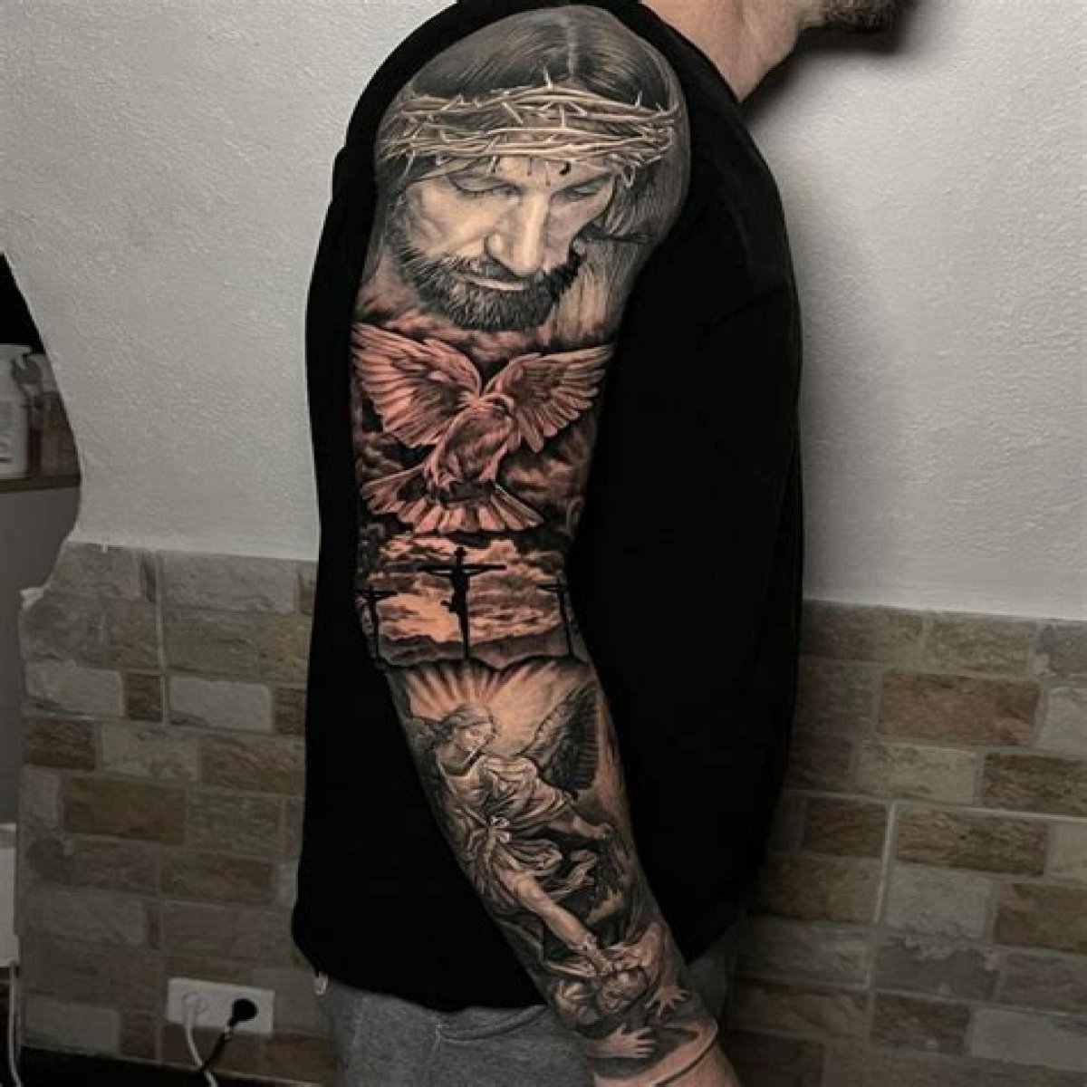 Unveiling The Power Of Men's Religious Arm Tattoos: Discoveries And Insights